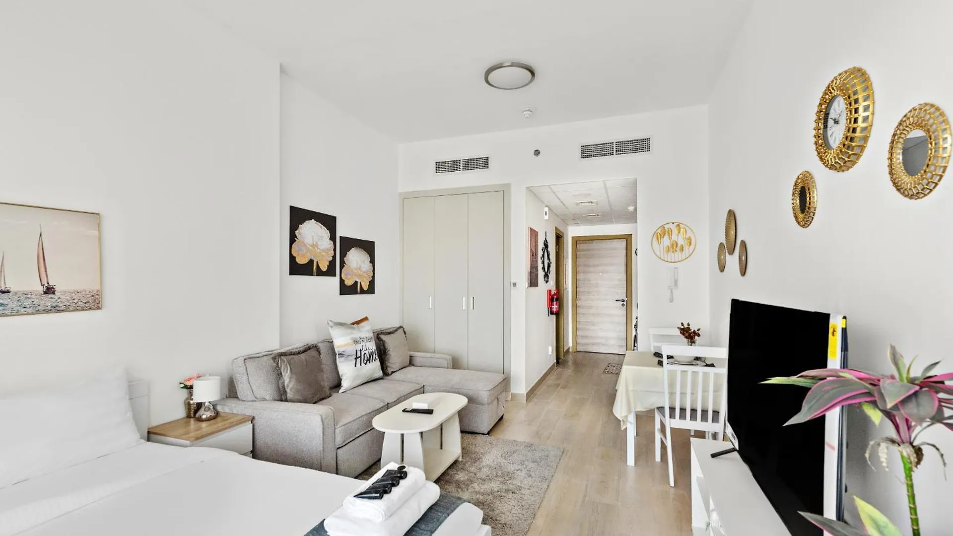 Modern Studio With Sofa Bed In Jvc- Дубай